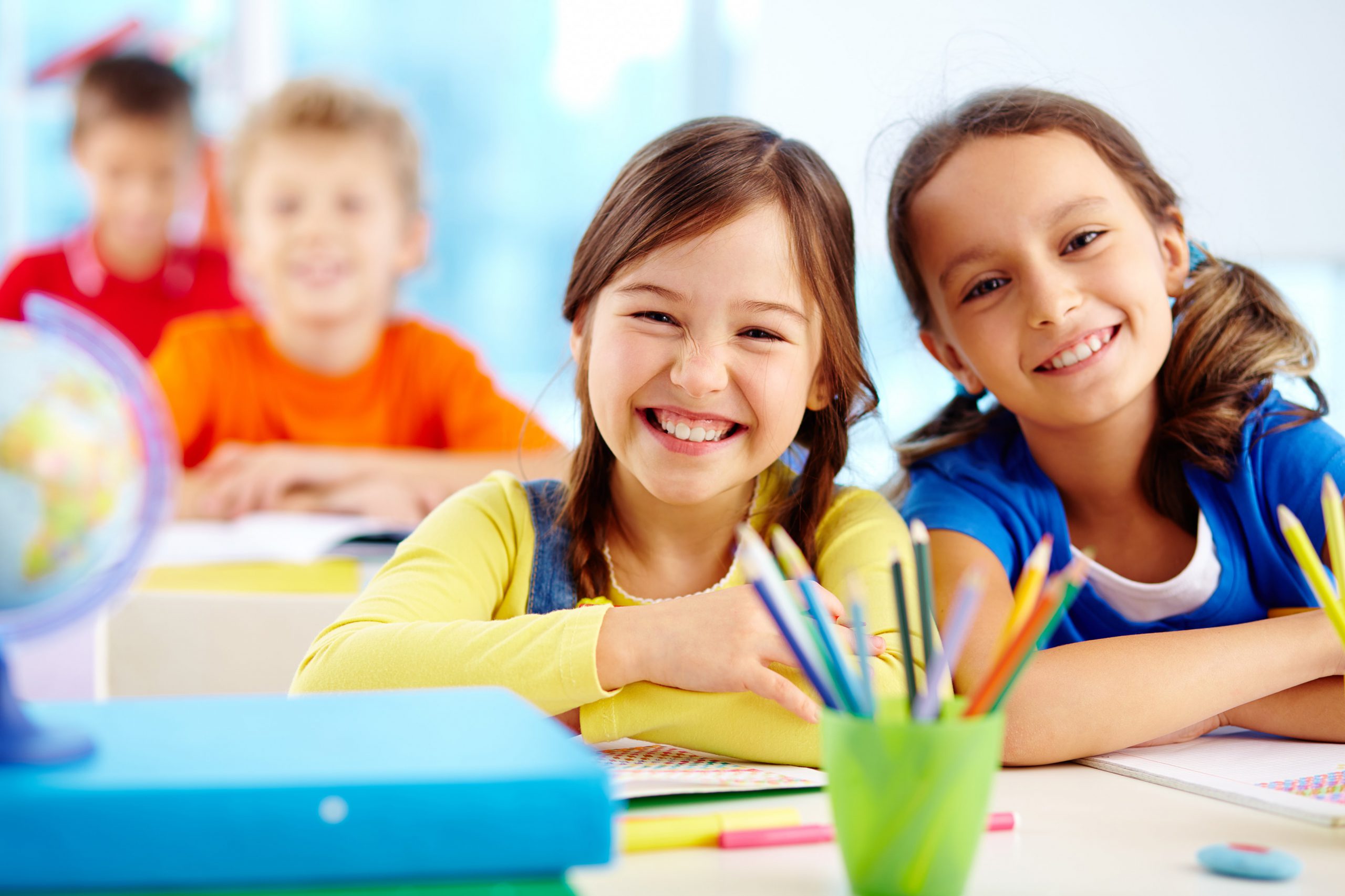 children smiling at school